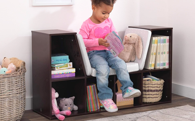 KidKraft Bookcase With Reading Nook 57 Shipped Free Stuff Finder   Girl Reading A Book On A KidKraft Bookcase With Reading Nook In Espresso Color 