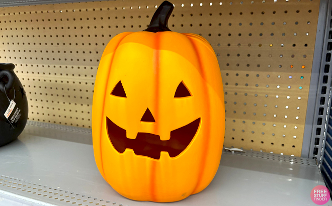 Halloween 13 4 Inch Orange Ceramic Clay Jack o Lantern Outdoor Decoration on a Shelf