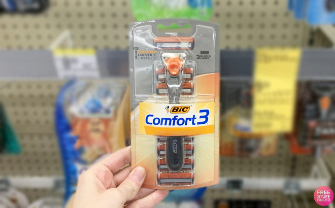 Hand Holding BIC Comfort 3 Mens Razor Kit