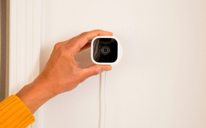 Hand Holding Blink Mini Smart Security Camera