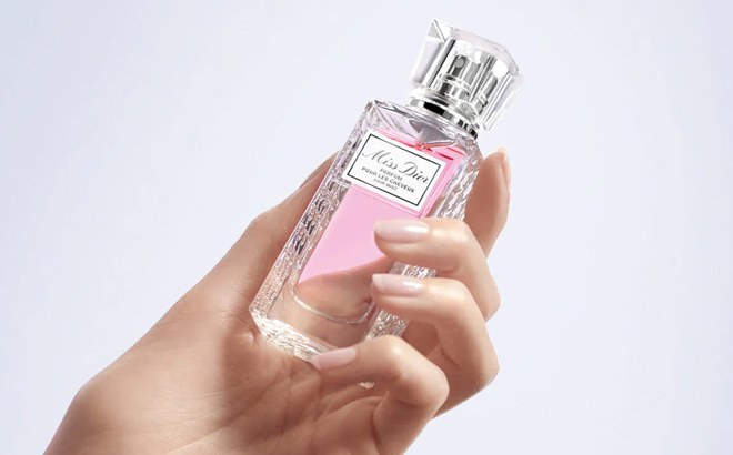 Hand Holding Dior Miss Dior Hair Mist