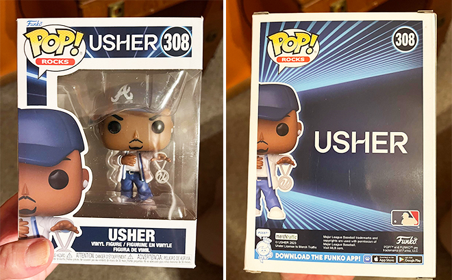 Hand Holding Usher Funko Pop from Two Different Angles in Box