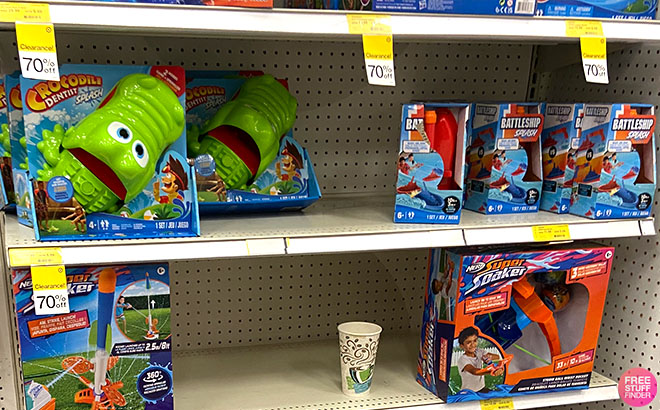 Hasbro Crocodile Dentist Splash Game and Hasbro Battleship Splash Game on a Shelf