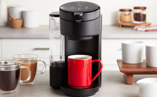Instant Solo Single Serve Coffee Maker on a Kitchen Table