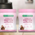 Natures Bounty Complete Protein Vitamin Shake Mix with Collagen Fiber Two Packs on a Kitchen Counter