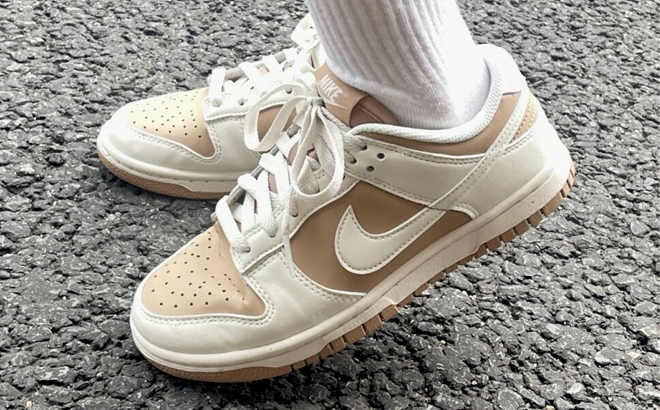 Person Wearing Nike Dunk Low Next Nature Shoes