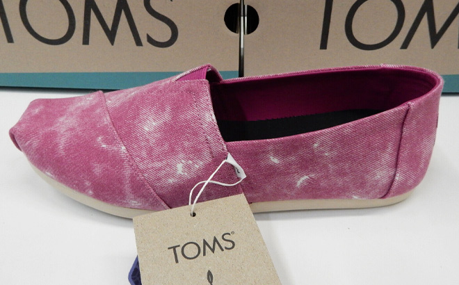 TOMS Pink Distressed Alpargata Womens Shoe on the table