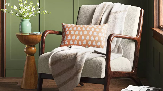 Threshold Border Striped Throw Blanket Draped on a Sofa