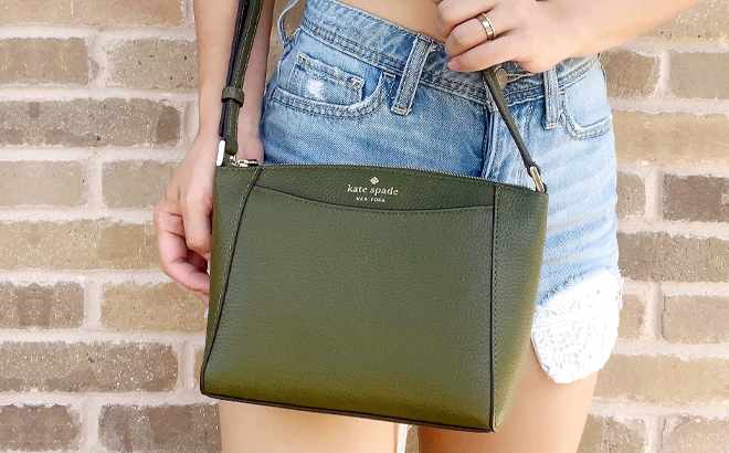 Woman Wearing Kate Spade Monica Crossbody in Enchanted Green