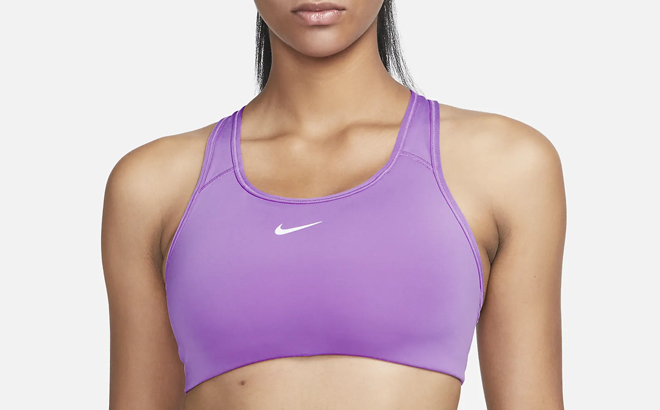 Woman Wearing Nike Swoosh Medium Support Pad Sports Bra