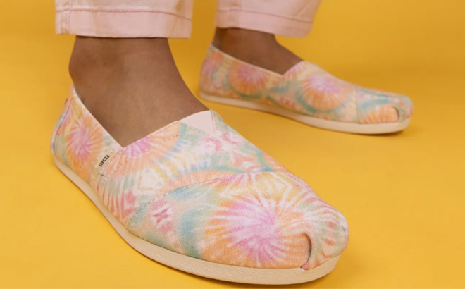 Woman is Wearing TOMS Womens Pink Orange Tie Dye Alpargata Shoes