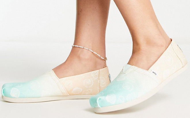 Woman is Wearing TOMS Womens Teal Ombre Seashell Alpargata