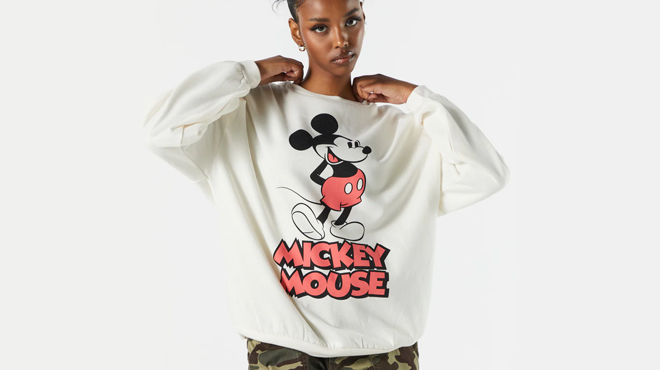 a Woman Wearing a Charlotte Russe Mickey Mouse Graphic Fleece Sweatshirt