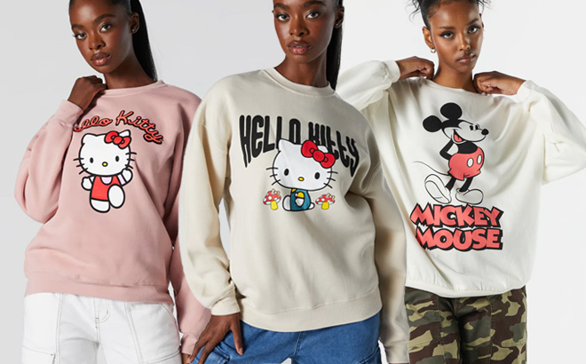 an Image of Three Women Wearing Three Different Styles of Charlotte Russe Graphic Sweatshirts