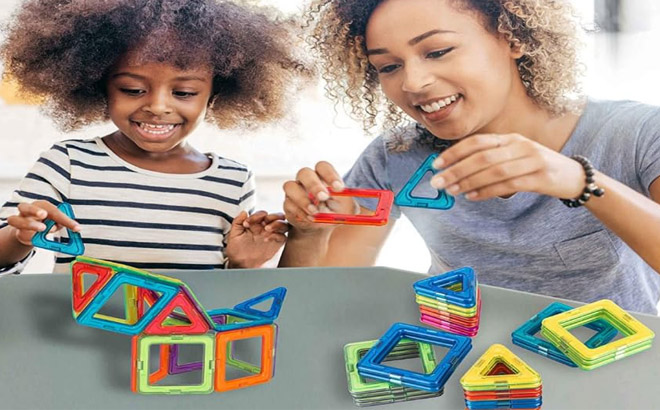 an Image of a Girl and a Woman Playing with a Magnetic STEM Building Blocks