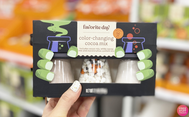 A Person Holding a Favorite Day Halloween Color Changing Cocoa Kit