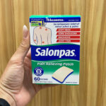 A Person Holding a Salonpas 60 Count Pain Relieving Patch