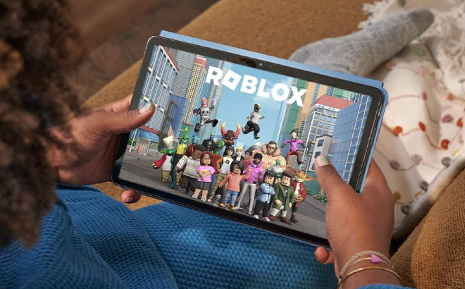 A Person Playing Roblox in Amazon Fire Max 11 Tablet