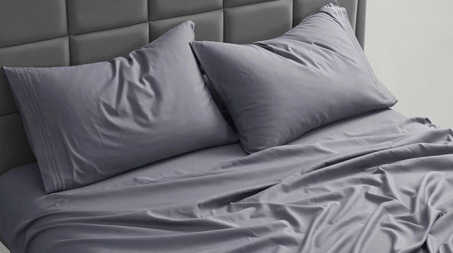 A Queen Bed with Microfiber 4 Piece Sheet Set in Gray Color 1