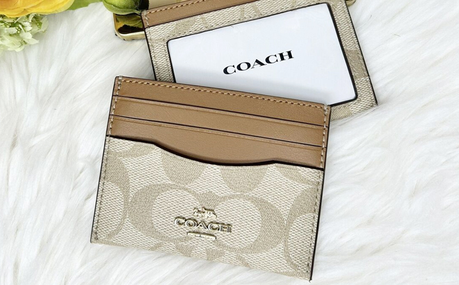 Extra 15% Off Coach Pennie Card Case In Signature Canvas @ Coach Outlet  $33.32 (Value $98) + Free Shipping - Extrabux