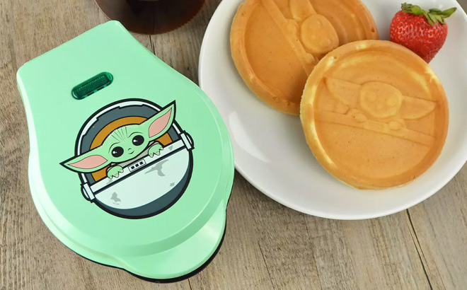 Disney Collection The Child Mini Waffle Maker on a Table