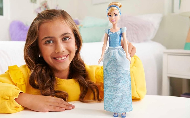 Girl Playing with her Disney Princess Cinderella Doll