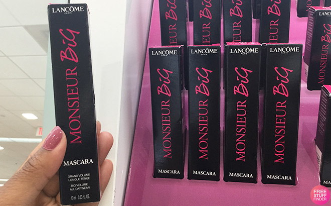 Hand Holding Lancome Monsieur Big Mascara in Store