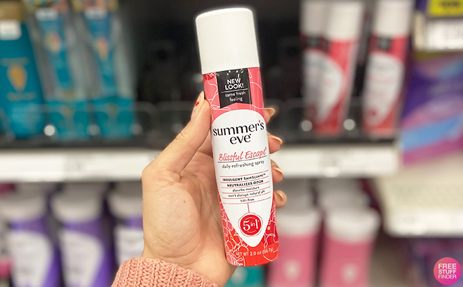 Hand Holding Summers Eve Blissful Escape Feminine Freshening Spray at Target