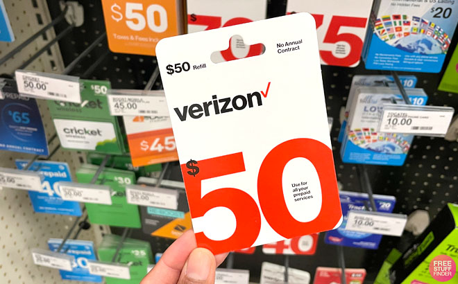 Hand Holding a Verizon 50 Prepaid Refill Card