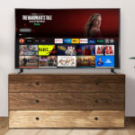 INSIGNIA 65 inch Smart Fire TV on Chest of Drawers