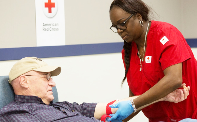 Man Donating Blood at Red Cross