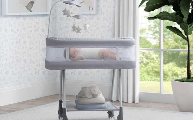 Platinum Simmons Kids Shooting Star Rocking Bassinet with Airflow Mesh