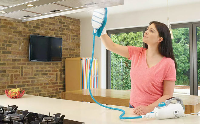 The Woman is Cleaning Using a BlackDecker 8 in 1 Steam Mop and Glove