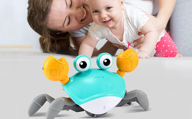 Toddler Being Excited fro the Crawling Crab Baby Toy