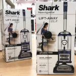 Two Shark Navigator Lift Away Deluxe Upright Vacuums on the Floor