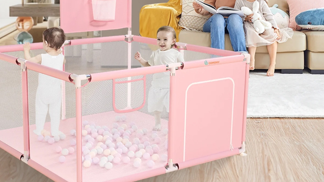 Two toddlers playing inside a Novafashion 4 Panel Baby Playpen