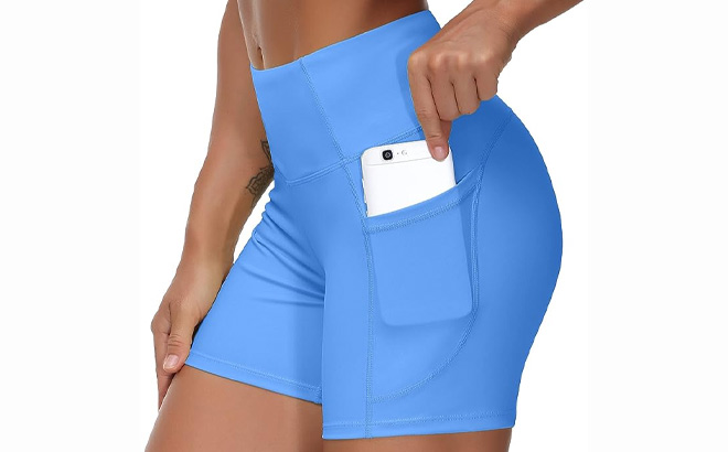 Woman Wearing High Waist Yoga Shorts in Blue