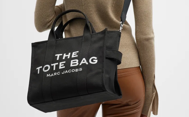 Woman Wearing Marc Jacobs The Medium Tote Bag in Black