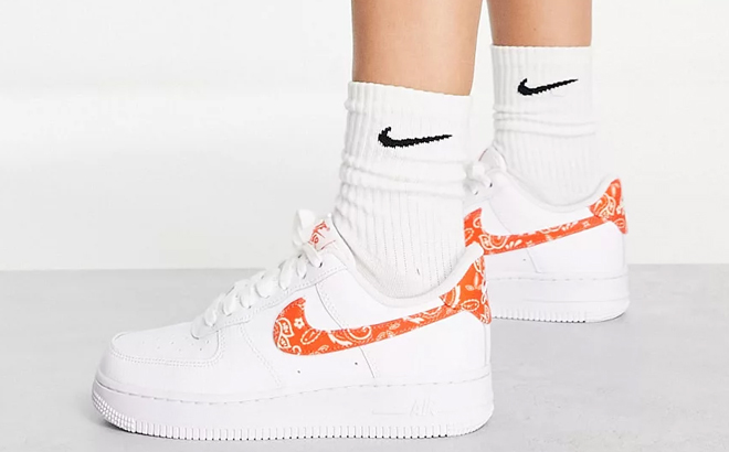 Woman Wearing Nike Air Force 1 '07 ESS Sneakers