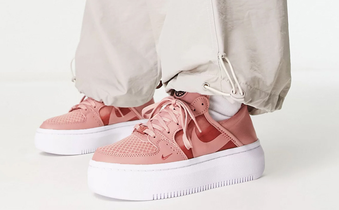 Woman Wearing Nike Court Vision Alta Platform Sneakers