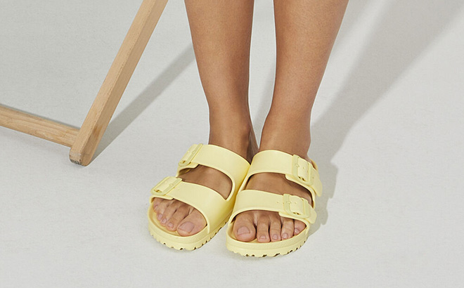 Woman is Wearing Birkenstock Arizona Eva Sandals in Popcorn Color