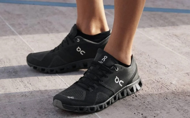 Woman is Wearing On Running Womens X Cloud 2 Shoes in Black Color