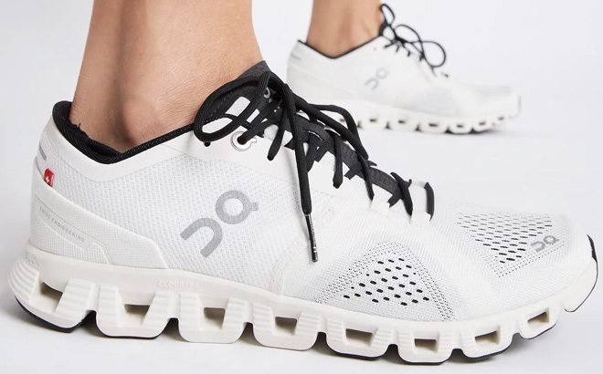 Woman is Wearing On Running X Cloud 2 Shoes in White Color