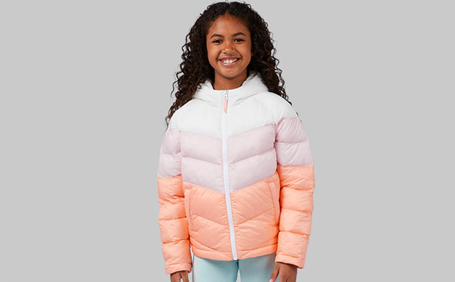 A Girl Wearing Orange 32 Degrees Puffer Jacket