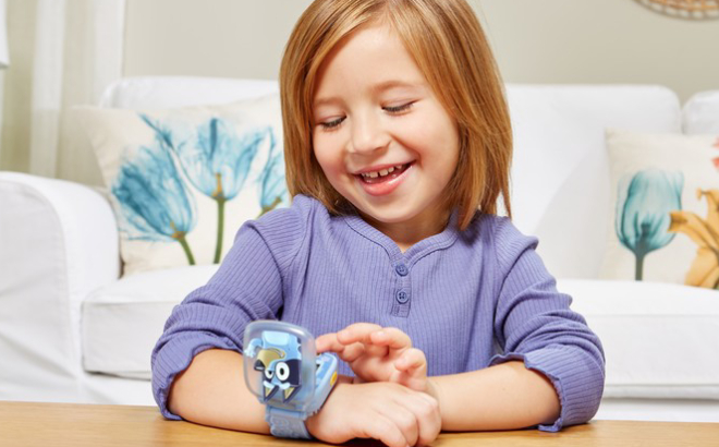 A Girl Wearing a VTech Bluey Wackadoo Watch