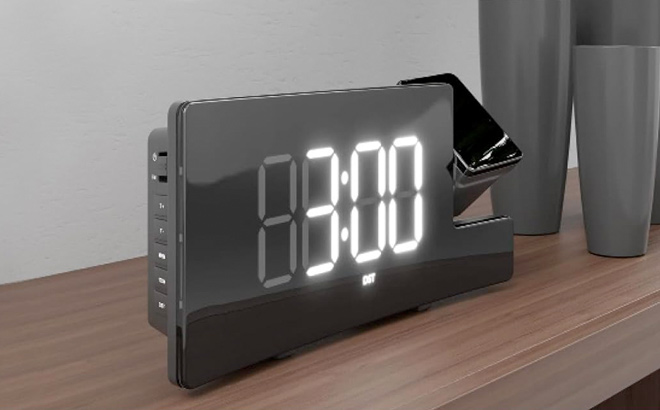 AmazonBasics Projection Alarm Clock with USB Phone Charging FM Radio Battery Backup