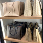 Coach Outlet Zip Top Tote Bags on Shelves