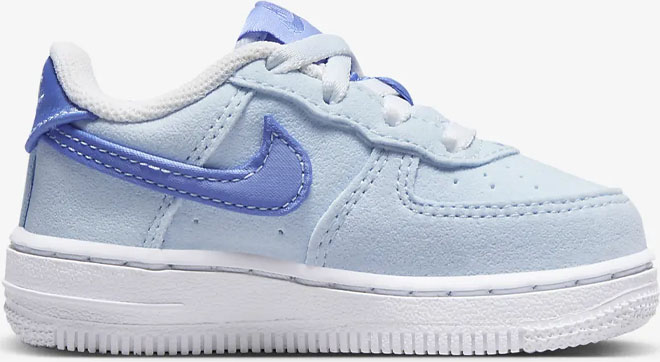 Color Blue Tint Nike Force 1 LV8 Toddler Shoes on a Gray Background