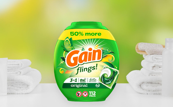 Gain Flings Laundry Detergent Soap on the Table