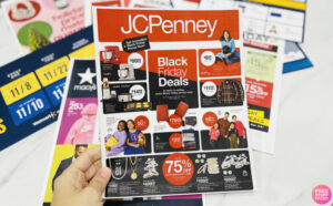 Hand Holding a JcPenney Black Friday 2023 Flyer Ad